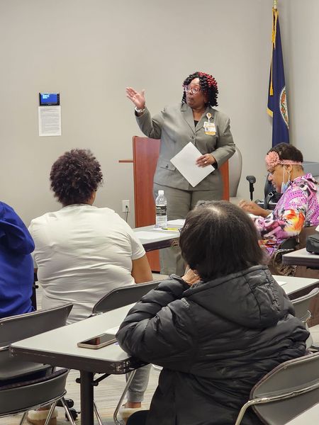 Joanne Bedford highlighted multiple strategies to use laughter and other stress management techniques to bring holistic health at the "Visioning a Healthier 2024" event.